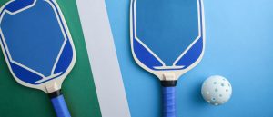 Sports | Blue Pickleball Paddles On Playing Court Wall Mural Sports Sports